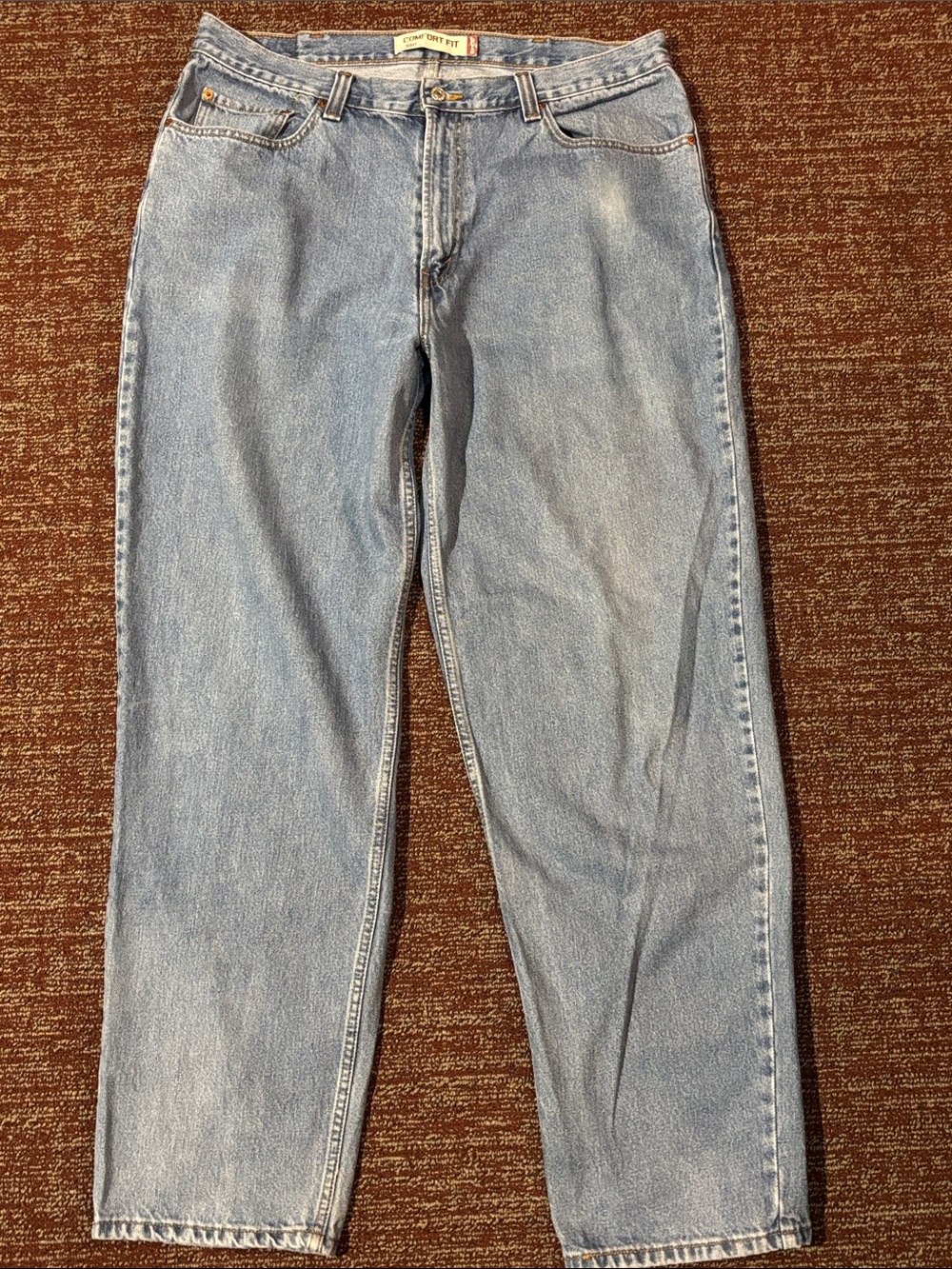 Levi's 569 comfort fit light wash vintage denim straight leg relaxed jeans long